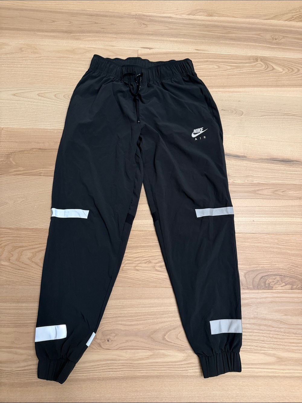 Nike Black Track Joggers with White Reflective Tabs